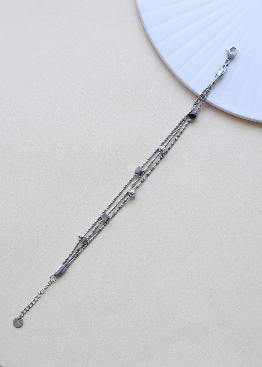 küp ve lazer kesim topçuk detaylı çoklu çelik bileklik